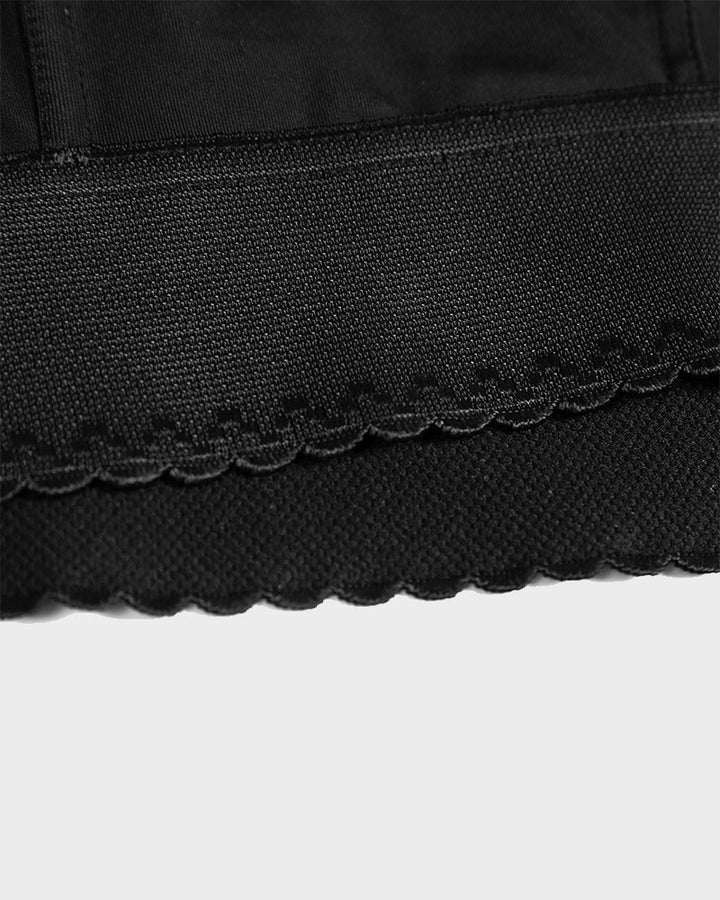 ContourFit longline push-up bra in black on model showing smooth silhouette under fitted clothing