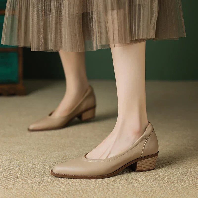 Cora slip-on pumps in brown, three-quarter view showing mid-height block heel