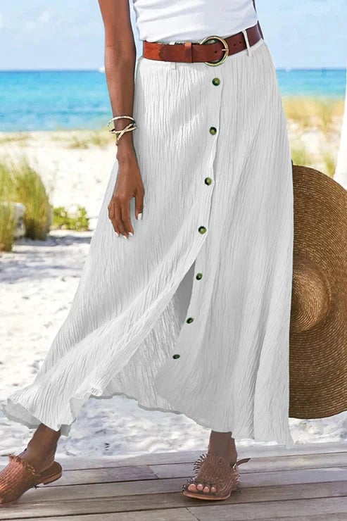 Side view of the linen-look maxi skirt showing the full-length button placket and crinkle texture detail