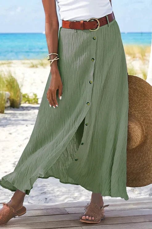 Flat lay of the button-front linen-look maxi skirt showing the ruffled hem and overall silhouette