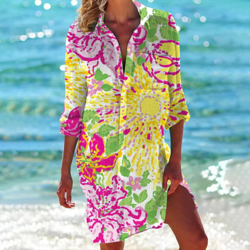 Front view of the Coralie tropical print shirt dress in yellow showing button placket and classic collar