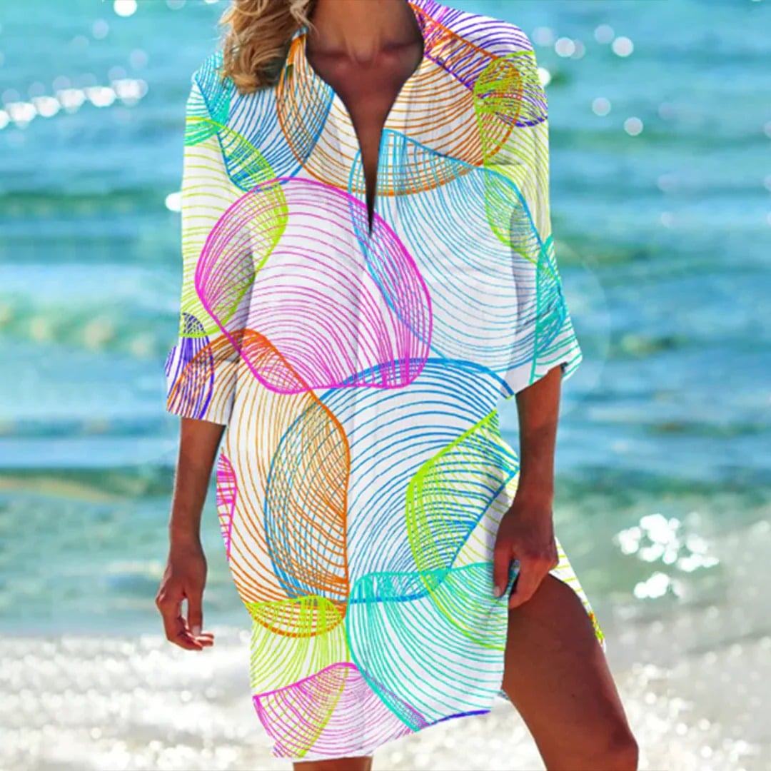 Full-length view of the Coralie shirt dress in pink mermaid colorway showing side slits and silhouette