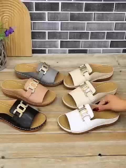Model wearing Cordelia cushioned buckle sandals styled with a summer outfit