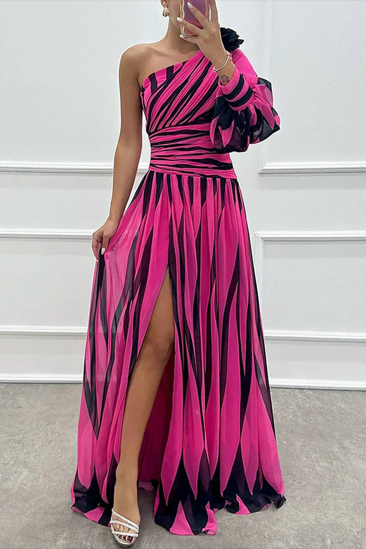 Close-up of the one-shoulder neckline detail on the Cordelia striped maxi dress in white
