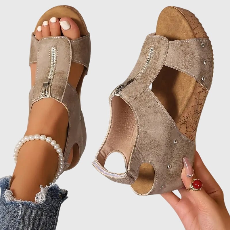 Side view of Cordula orthopedic sandal in black showing zipper detail and arch support sole