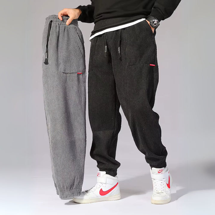 Detail shot of the corduroy fabric and waistband on the classic joggers