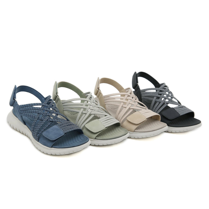 Close-up of Cosette sandal adjustable strap hardware in green