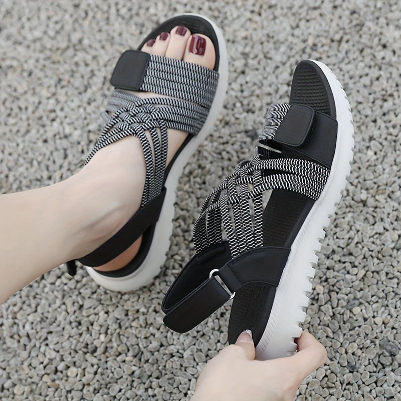 Cosette orthopedic sandals in blue worn on feet, lifestyle shot
