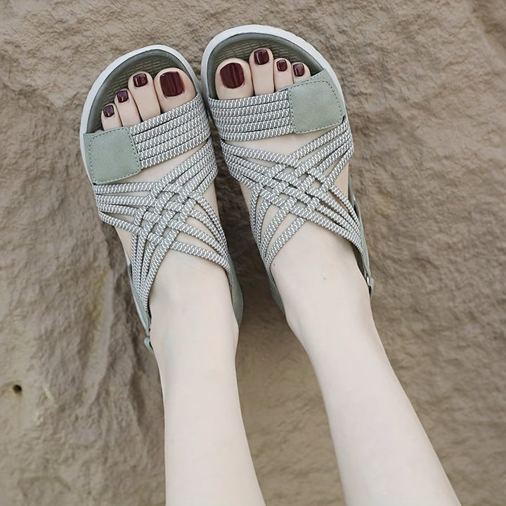 Cosette women's sandals in blue flat lay on light surface