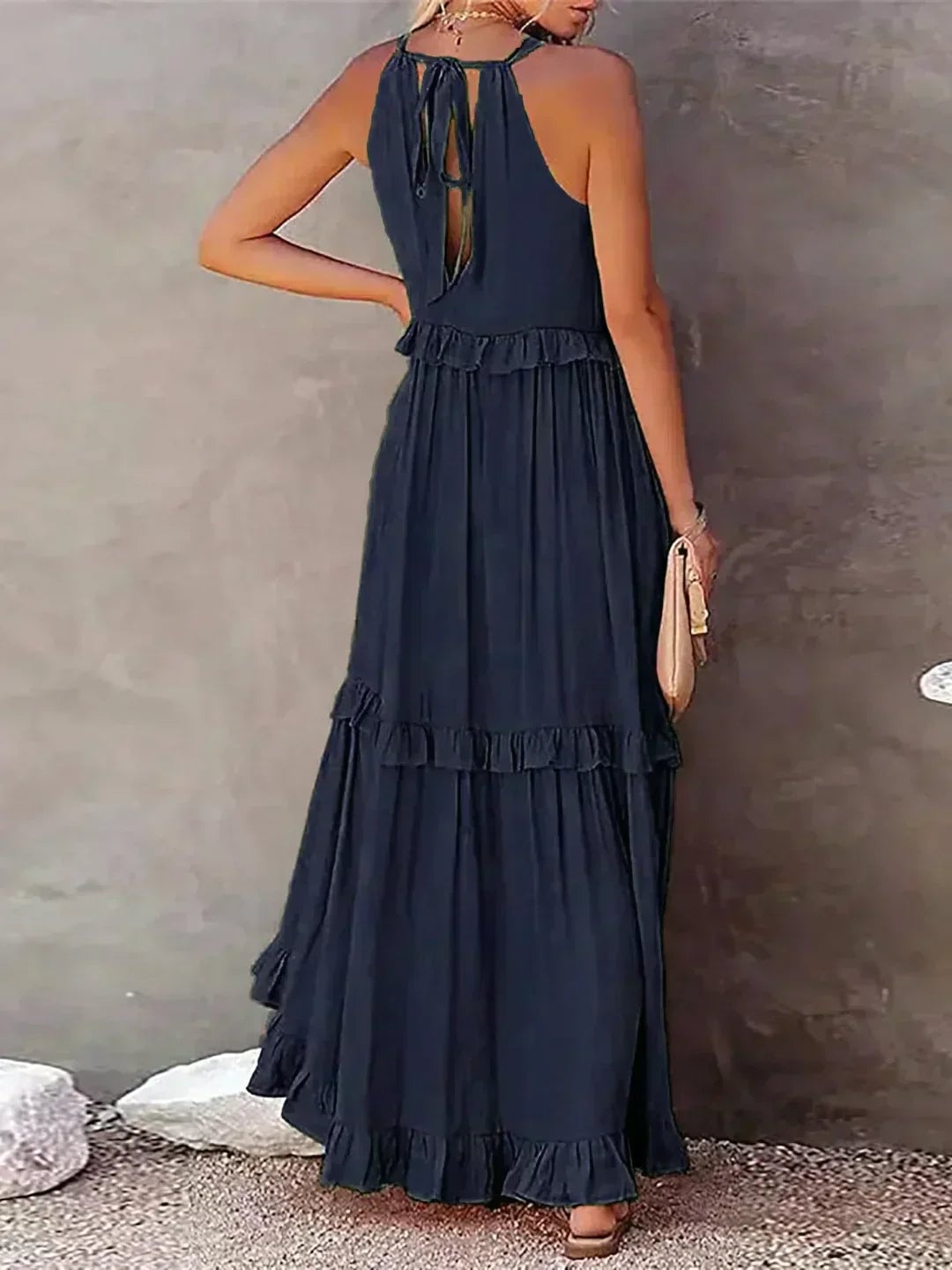Courtney ruffle dress in pink, showing sleeve opening and ruffle placement detail
