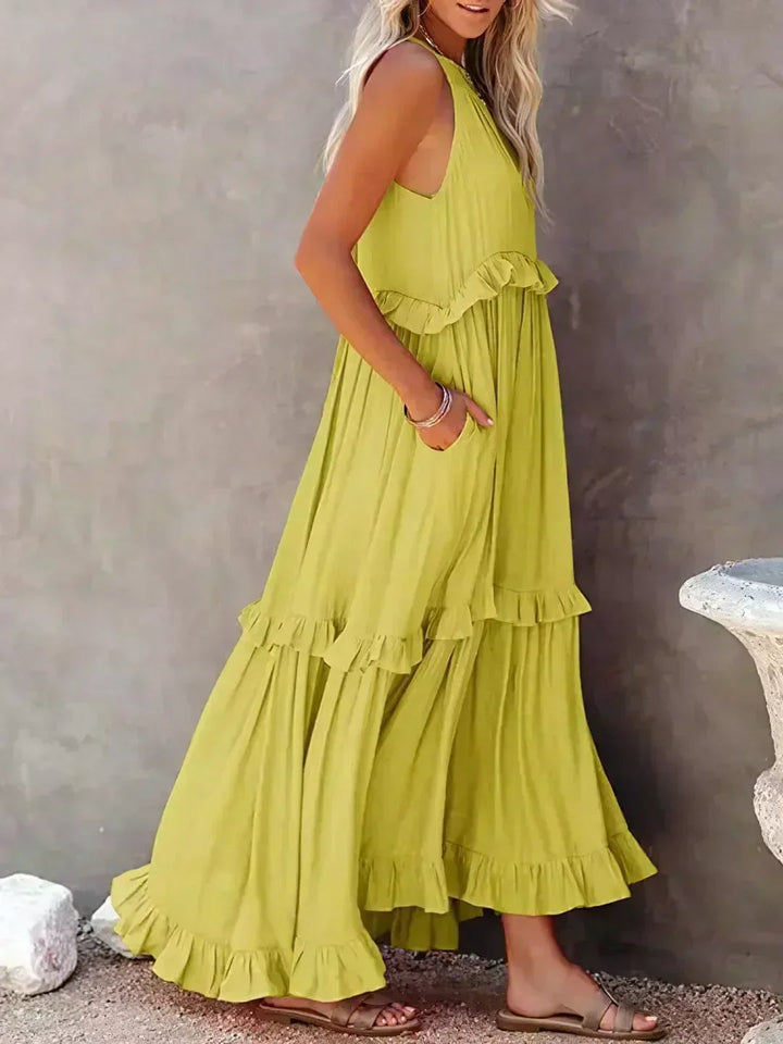 Courtney ruffle dress in purple, full-length shot showing the complete silhouette