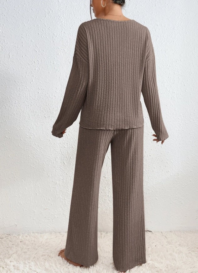 Front view of V-neck ribbed knit sweater from the two-piece set in pink