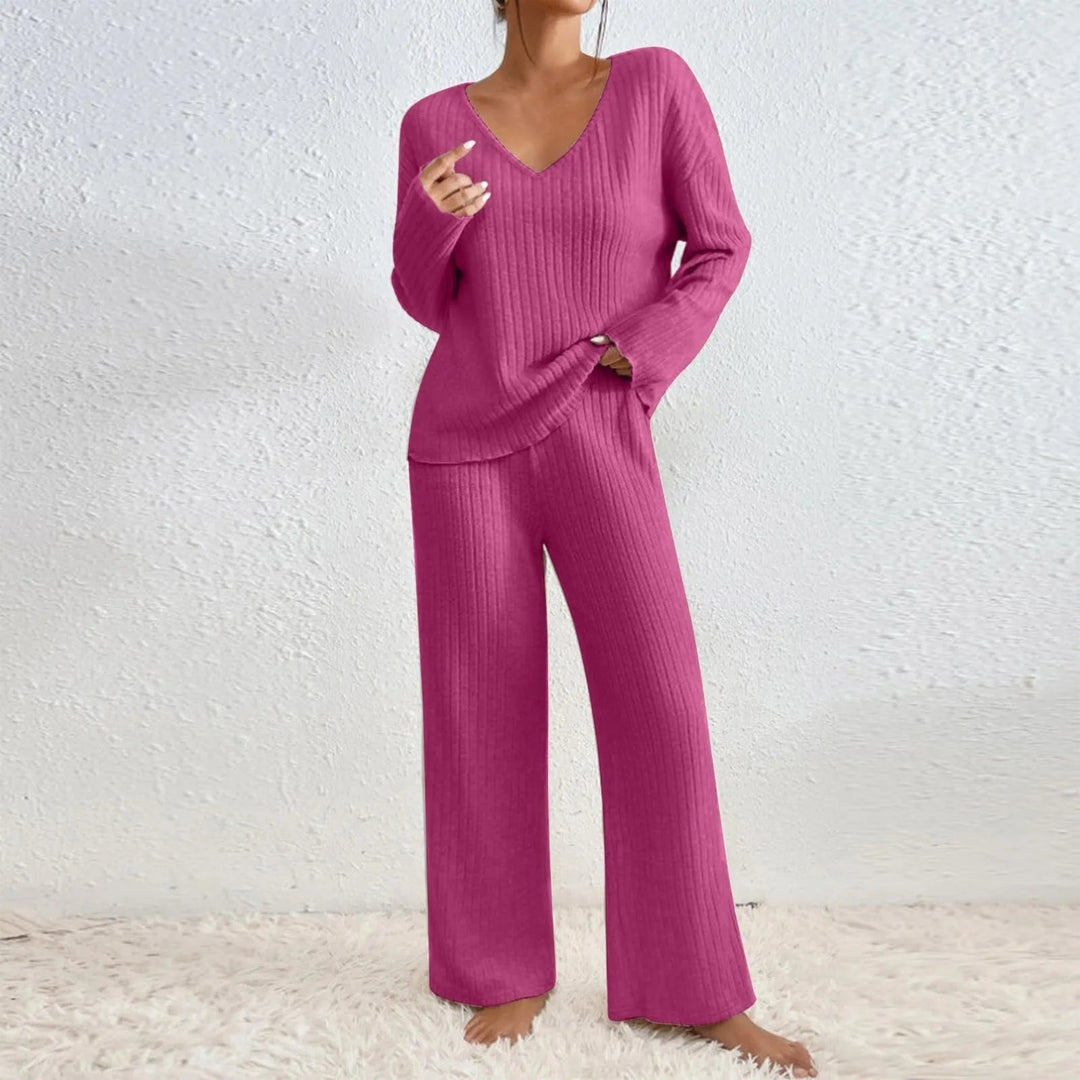 Close-up of the V-neckline detail on the ribbed knit sweater