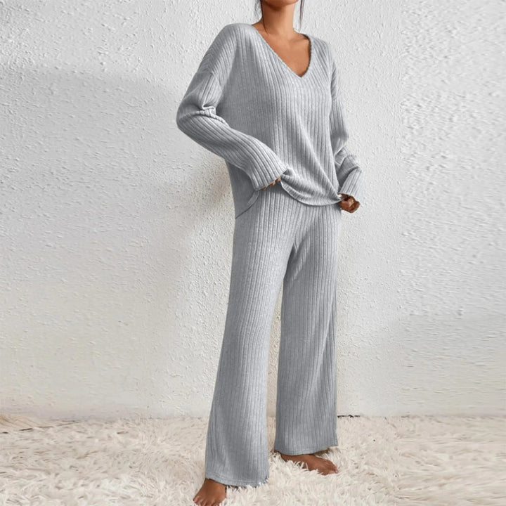 Detail shot of ribbed knit fabric and waistband on the matching trouser set