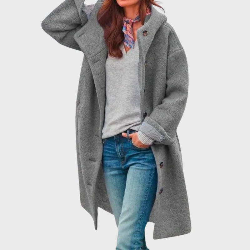 Close-up detail of warm classic coat fabric texture and secure front closure