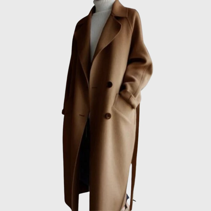 Close-up detail of the premium fabric blend and secure closure on a longline overcoat