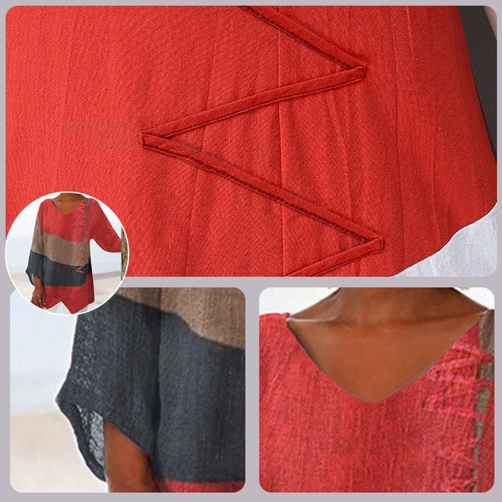 Close-up of asymmetrical hem detail on brushstroke print long shirt