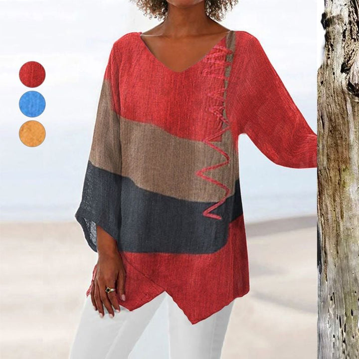 Flat lay of artistic brushstroke long shirt in blue showing full length and hem