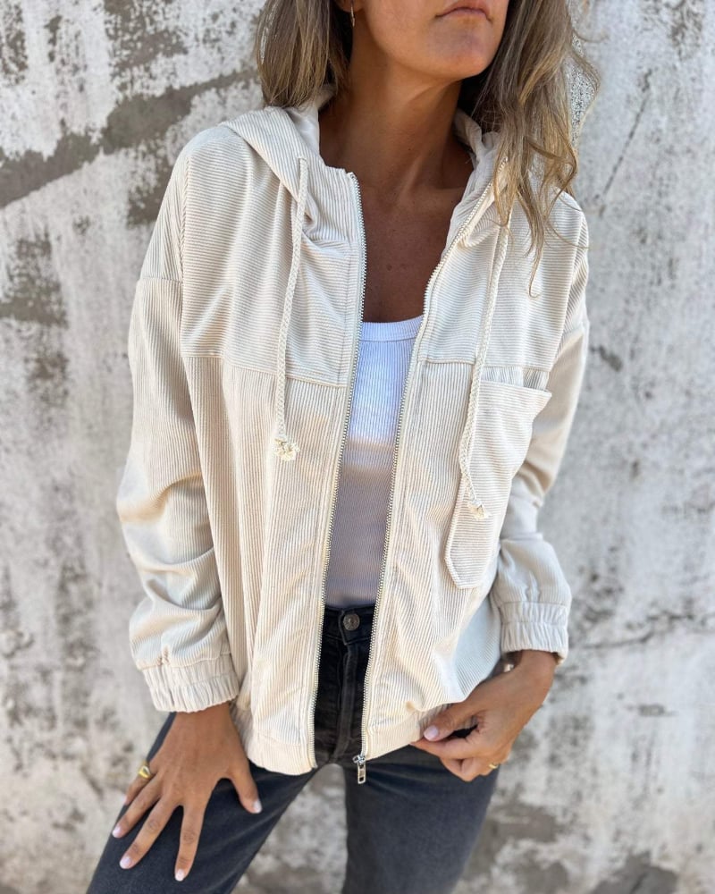 Woman wearing the Cynthia hooded zip jacket in a relaxed casual style, front view