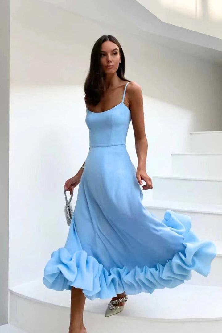 Front view of the Dahlia dress showing its elegant waist-defining drape
