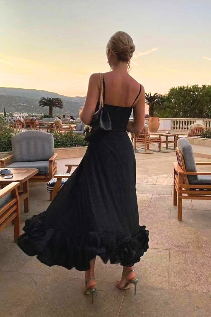 Dahlia dress in black — lightweight fabric skimming the body gracefully