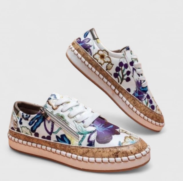 Side profile of Dahlia platform sneaker showing cork-effect midsole with woven rope-style stitching detail