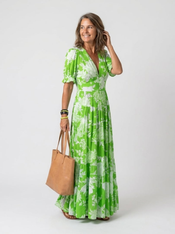 Full-length back view of the Dahlia floral midi dress in sky blue