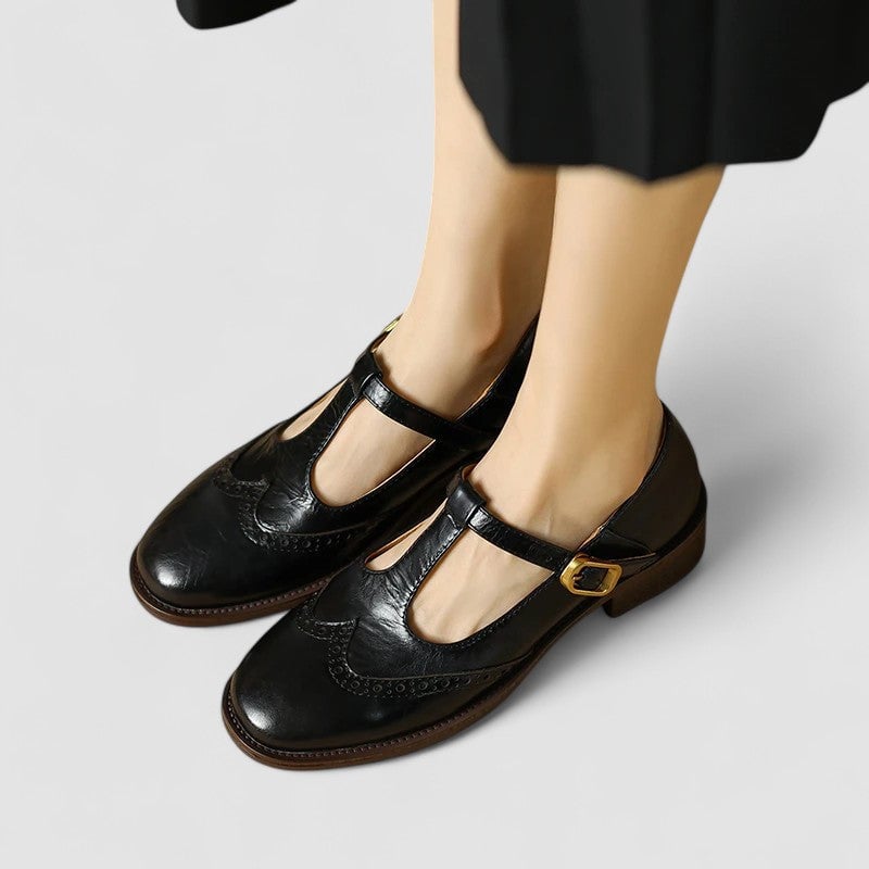 Side profile of the Daisy Mary Jane shoes in black showing flexible sole and cushioned footbed