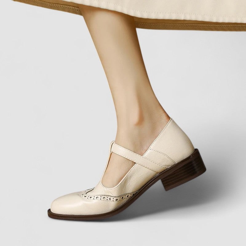 Heel view of the Daisy casual Mary Jane shoes in brown showing lightweight construction