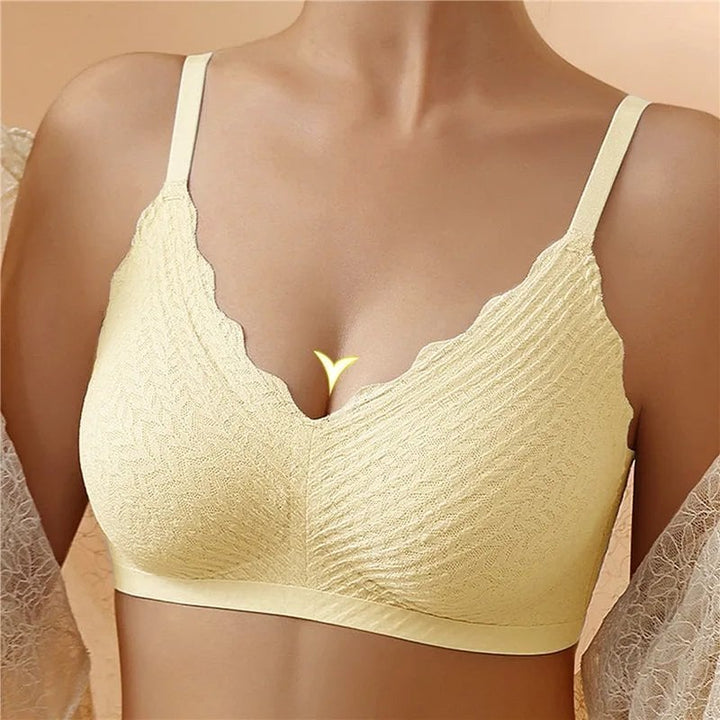 Seamless comfort bra laid flat showing adjustable elastic band and back clasp detail