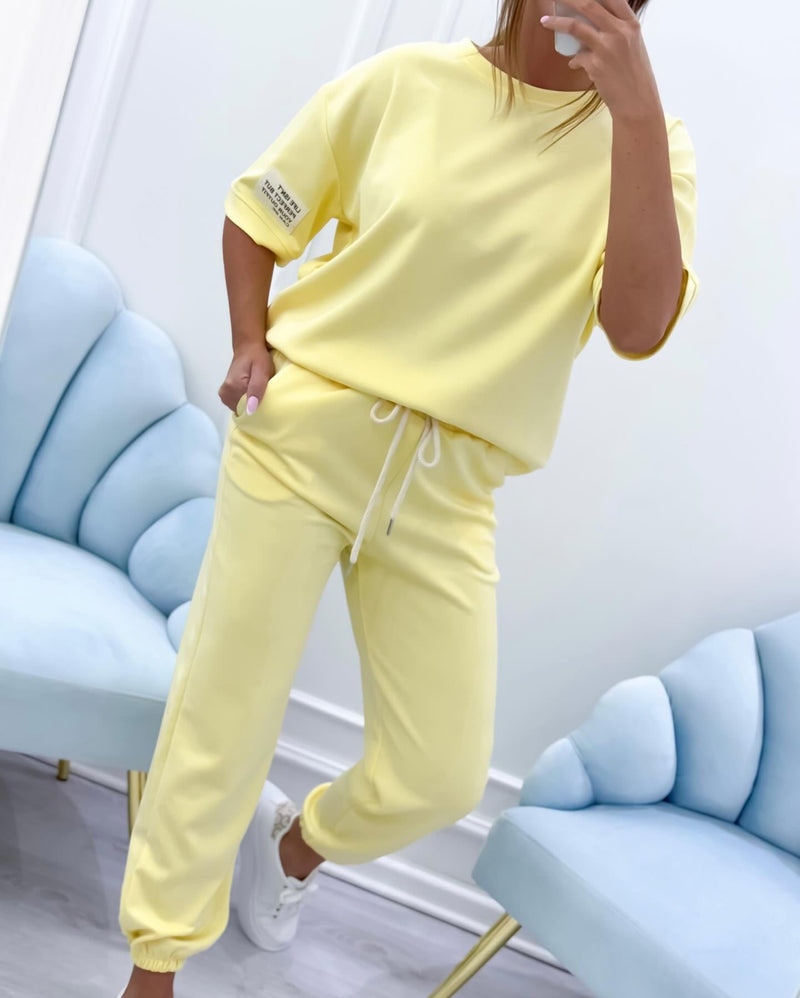 Yellow short sleeve matching set styled casually for an everyday daytime look