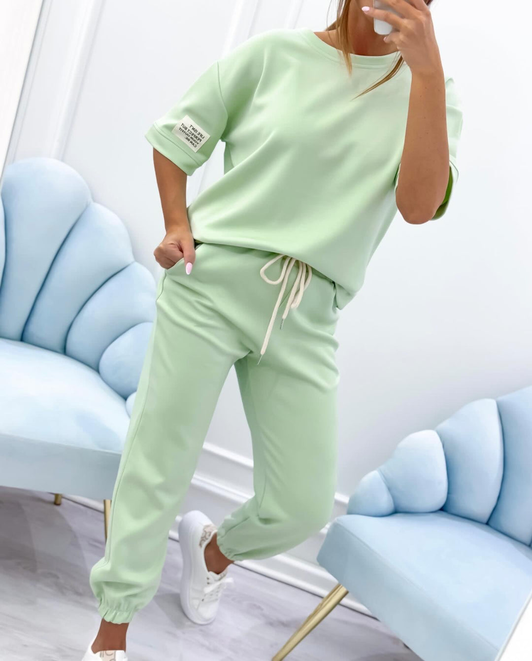 Green short sleeve matching set featuring coordinated top and trouser set