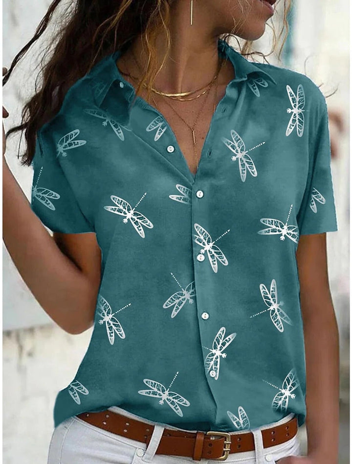 Close-up of the dragonfly print pattern and pointed collar on the Daisy button-down shirt in pink