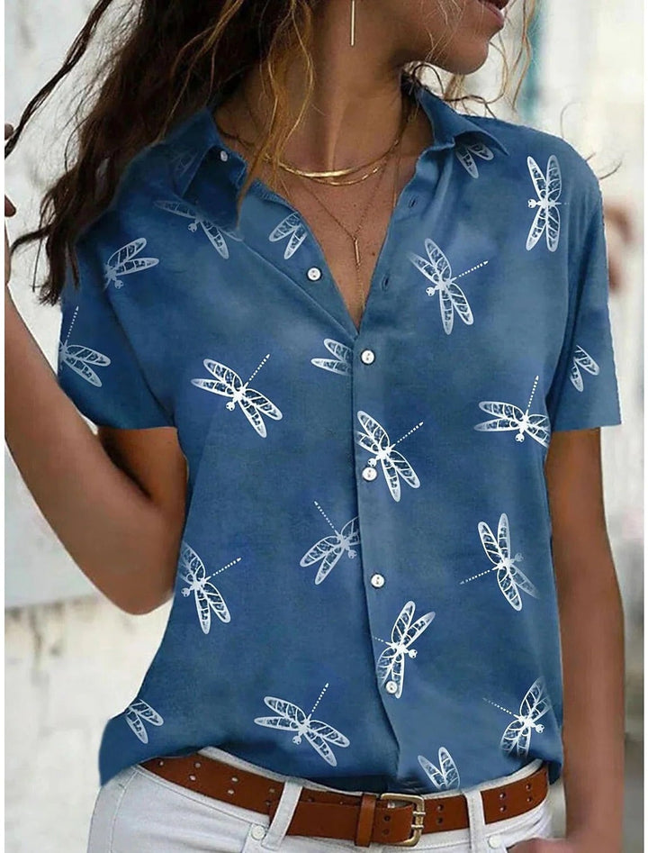 Flat lay of the Daisy dragonfly print short sleeve shirt showing full front button placket and print detail