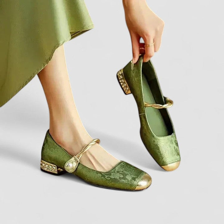 Green orthopedic mary jane shoes with rounded toe and classic strap, side view
