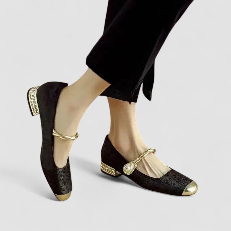 Black orthopedic mary jane shoes with rounded toe and classic strap, side view