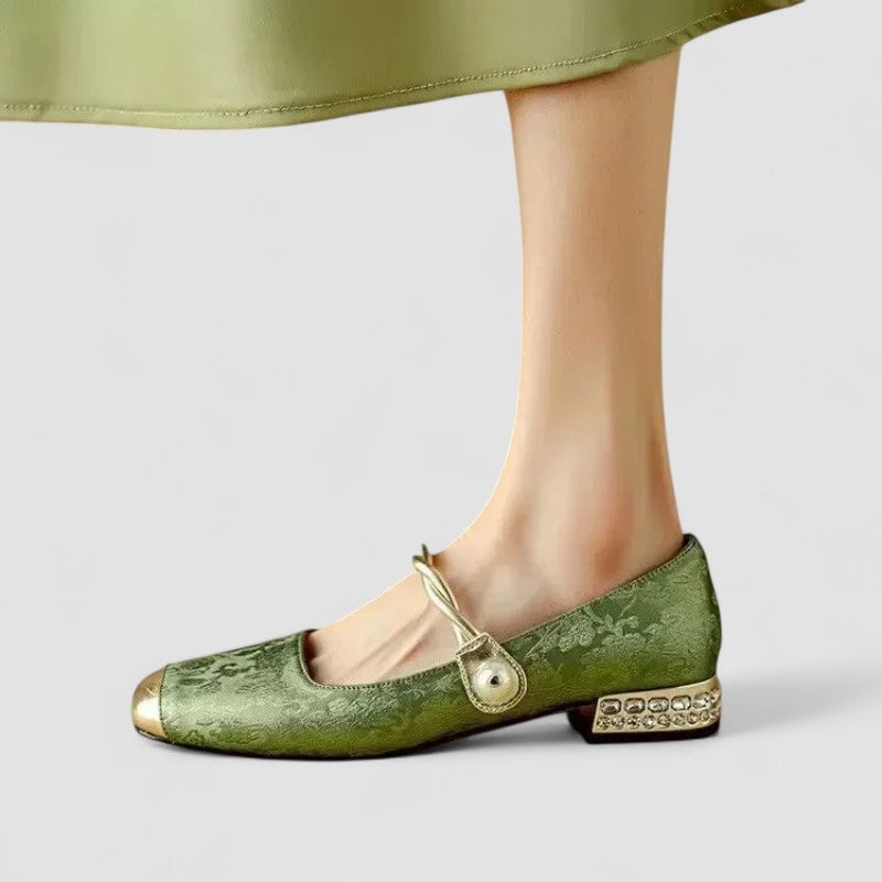 Close-up of the Mary Jane strap and refined finish on green orthopedic shoes