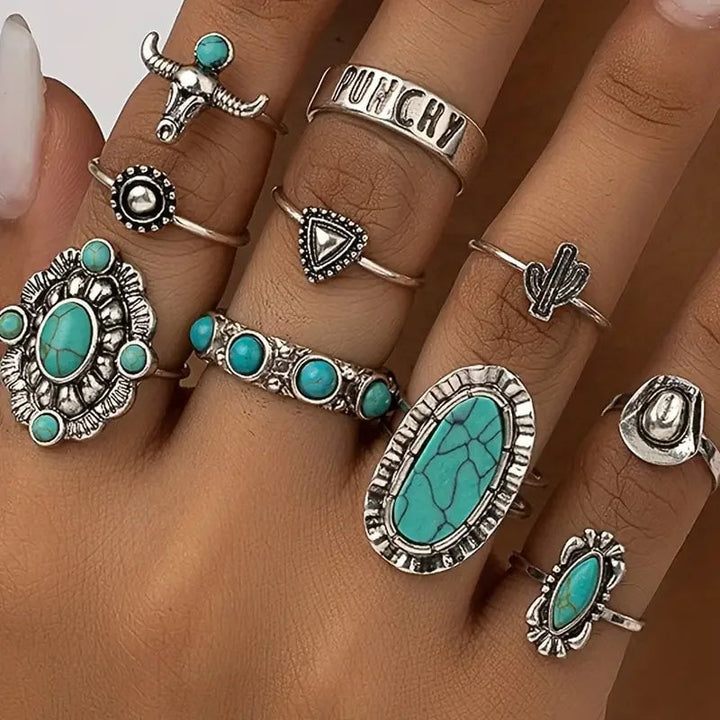 10-piece western turquoise stacking ring set laid out flat showing all designs