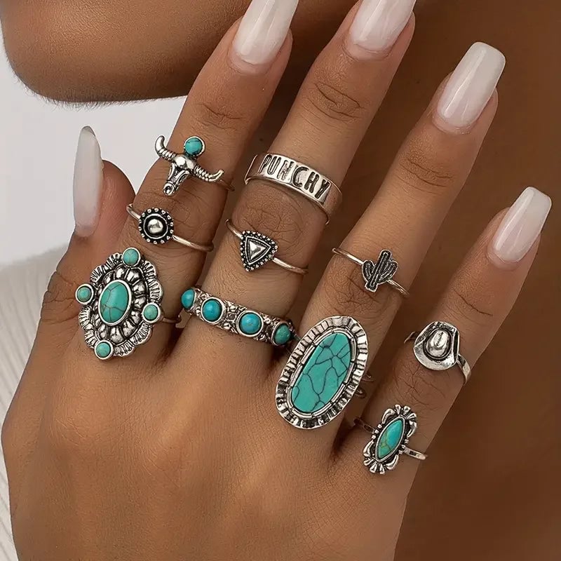 Variety of turquoise ring styles from the 10-piece set displayed together