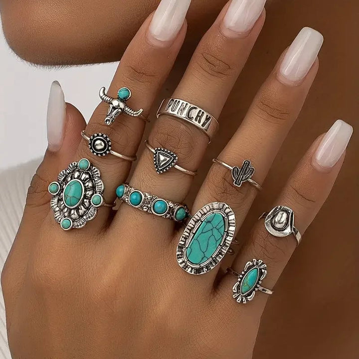 Variety of turquoise ring styles from the 10-piece set displayed together