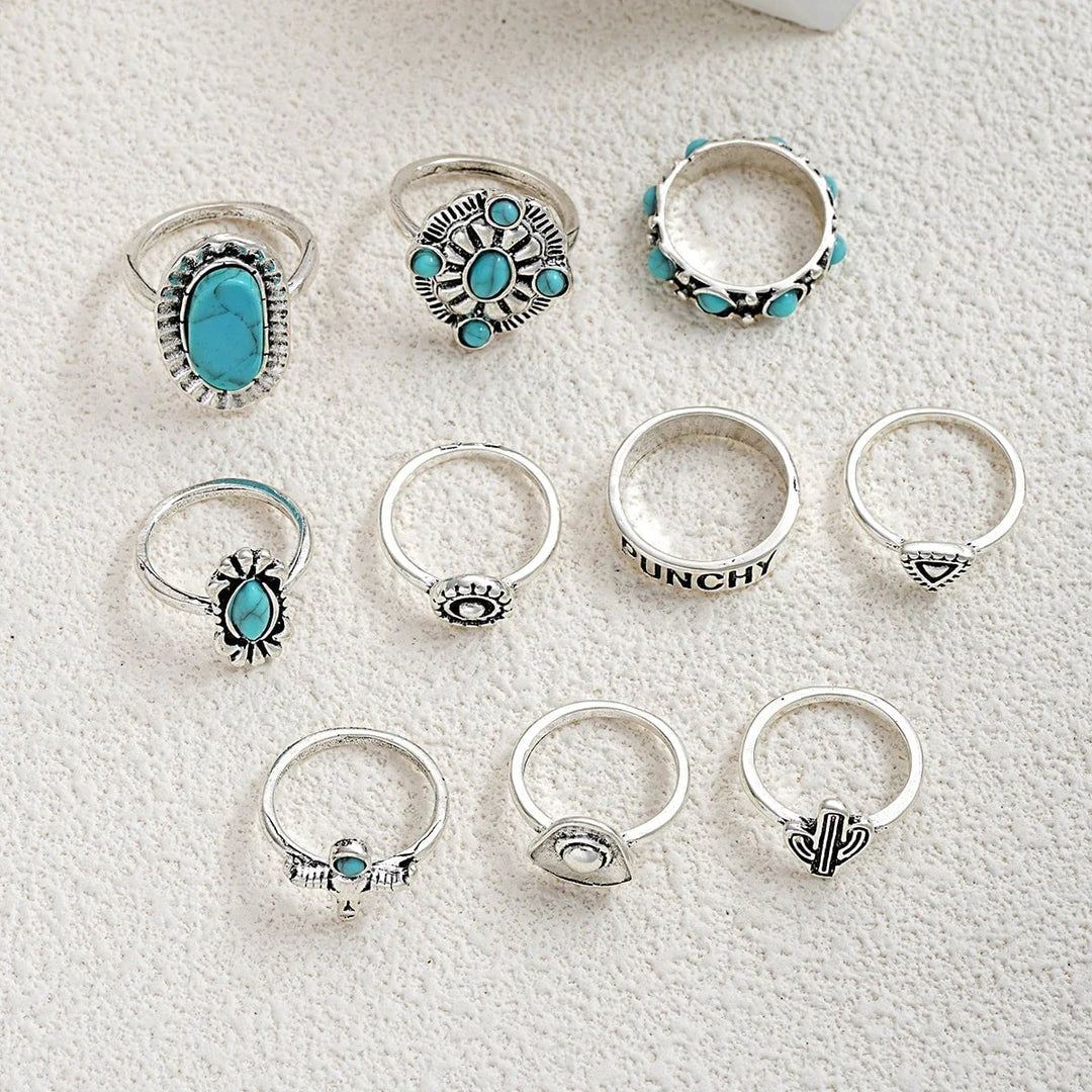 Detail shot of turquoise and silver-toned western ring designs