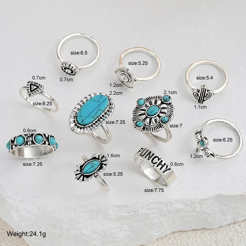 Full 10-piece turquoise ring set arranged in a styled flat lay