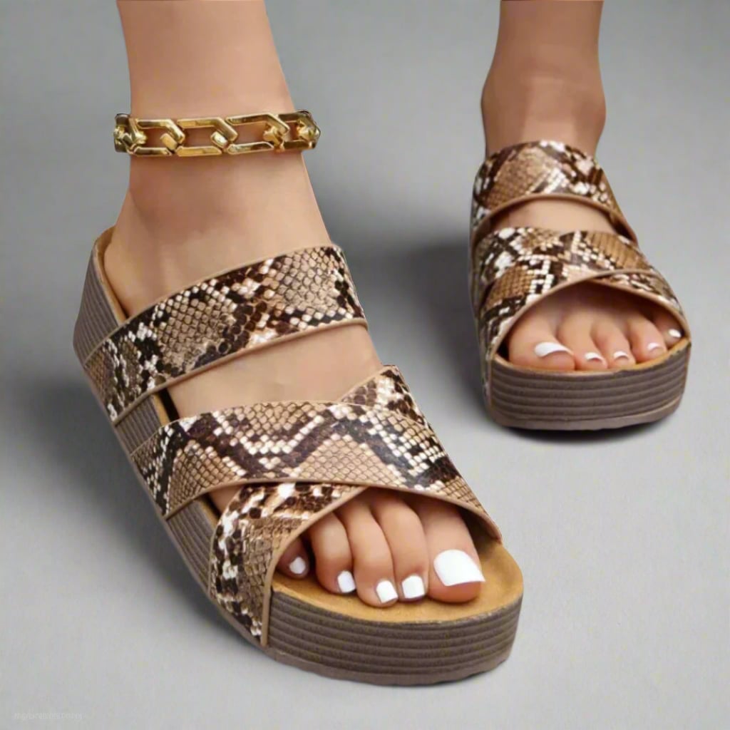 Dana sandals in snake print colorway styled with a casual spring outfit