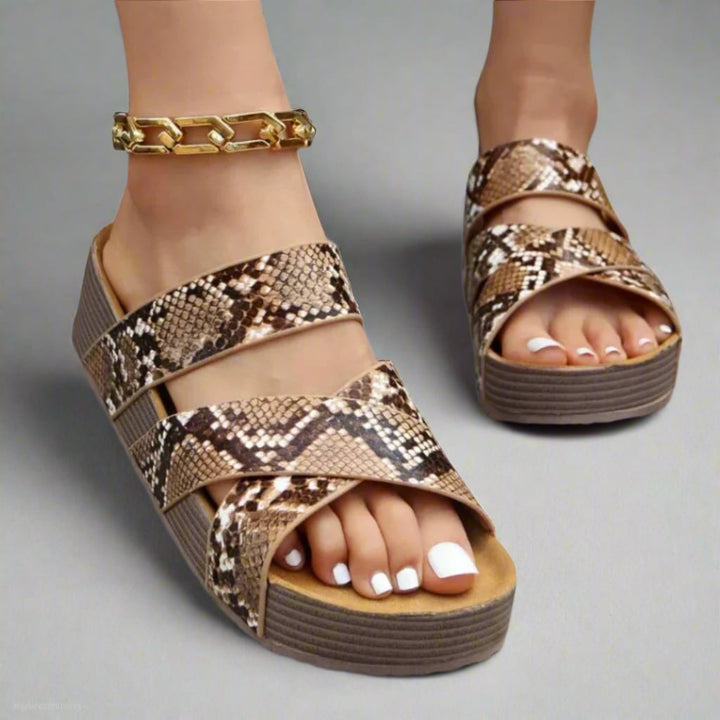 Dana sandals in snake print colorway styled with a casual spring outfit