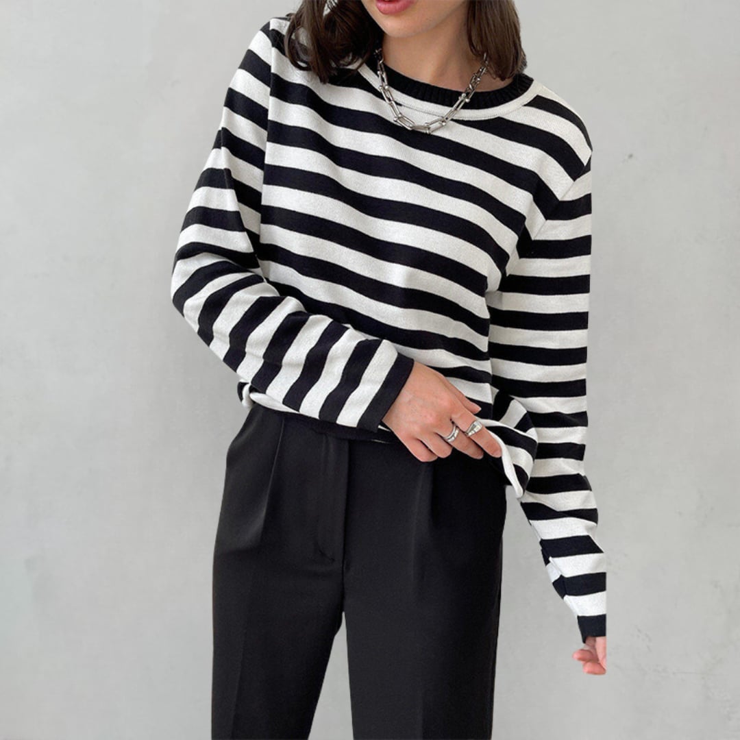Dana striped T-shirt styled with denim jeans and sneakers for an easy everyday outfit