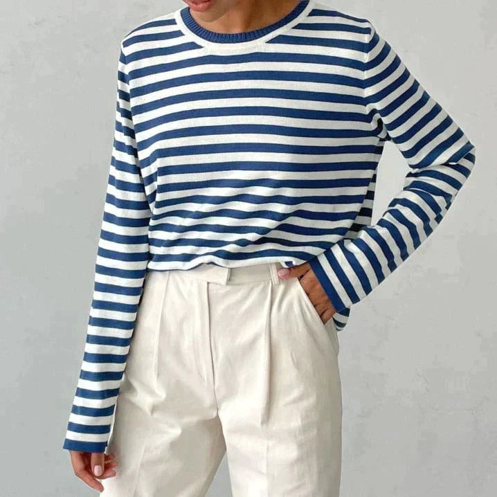Dana striped T-shirt in red worn with a midi skirt and sandals for a versatile warm-weather look