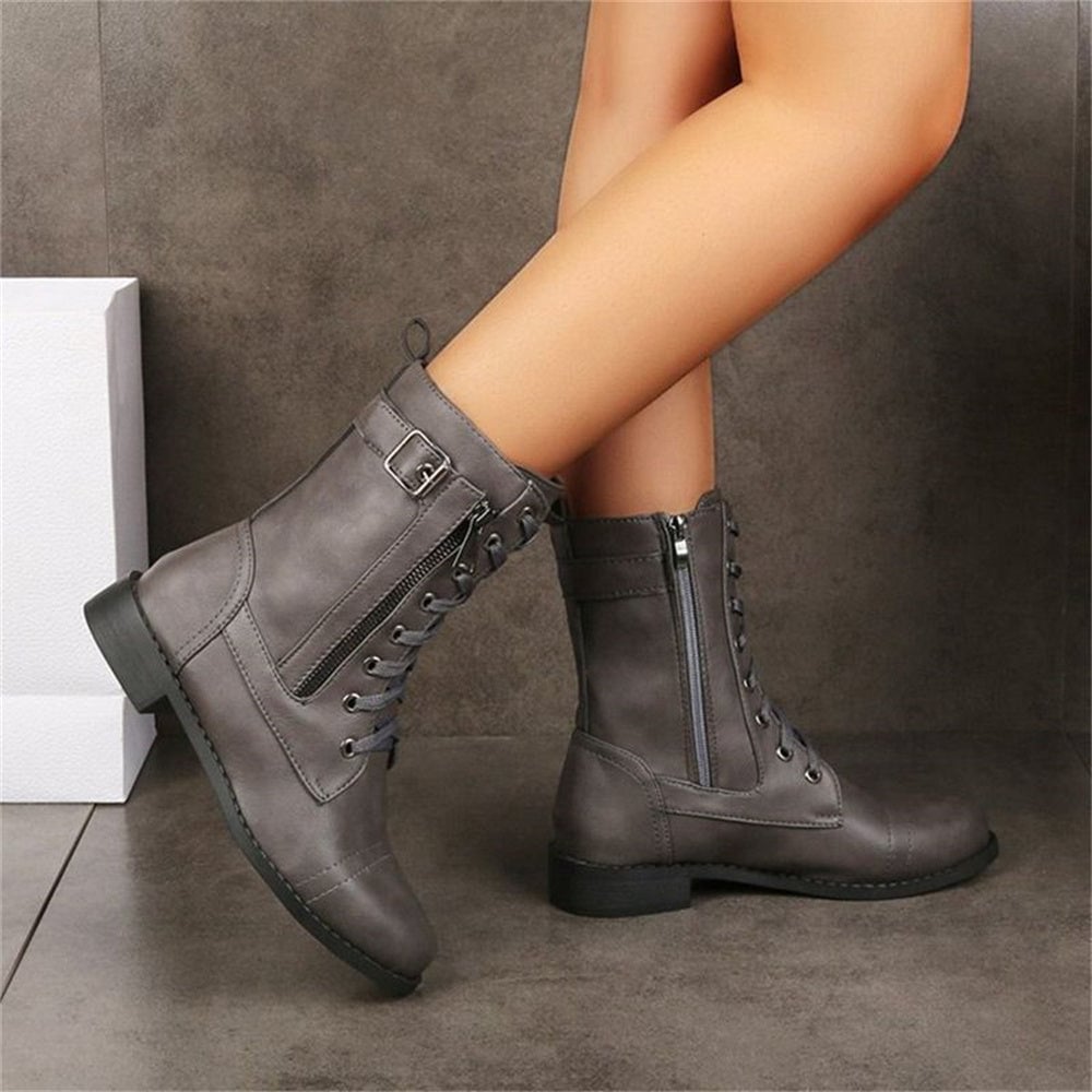 Side profile of toe side zipper orthopedic boot showing non-slip sole and smooth side zipper closure