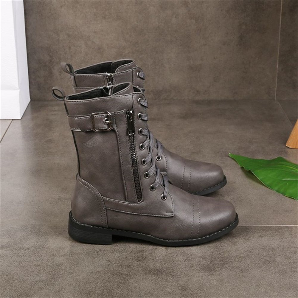 Brown orthopedic side zipper boot on a neutral background, three-quarter angle