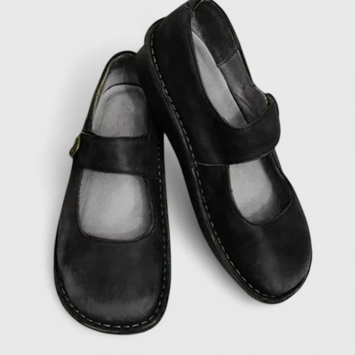 Danielle orthopedic shoe in brown colorway showing the elongating silhouette from a three-quarter angle