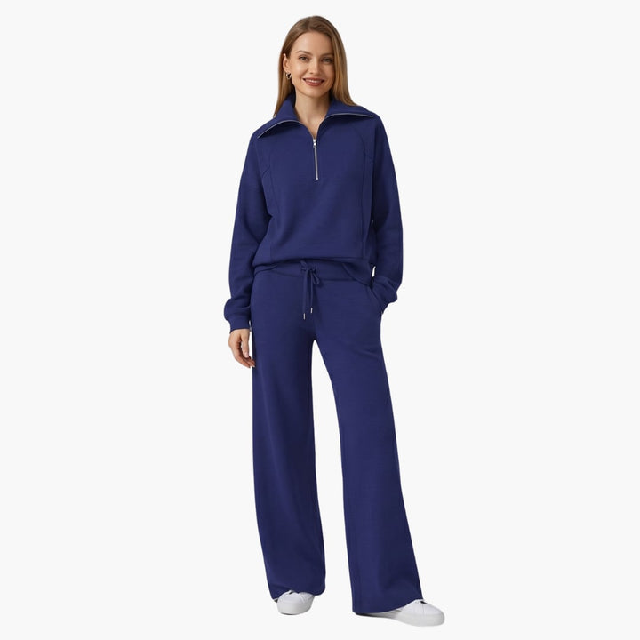 Women's half zip wide leg lounge set in black styled with slides